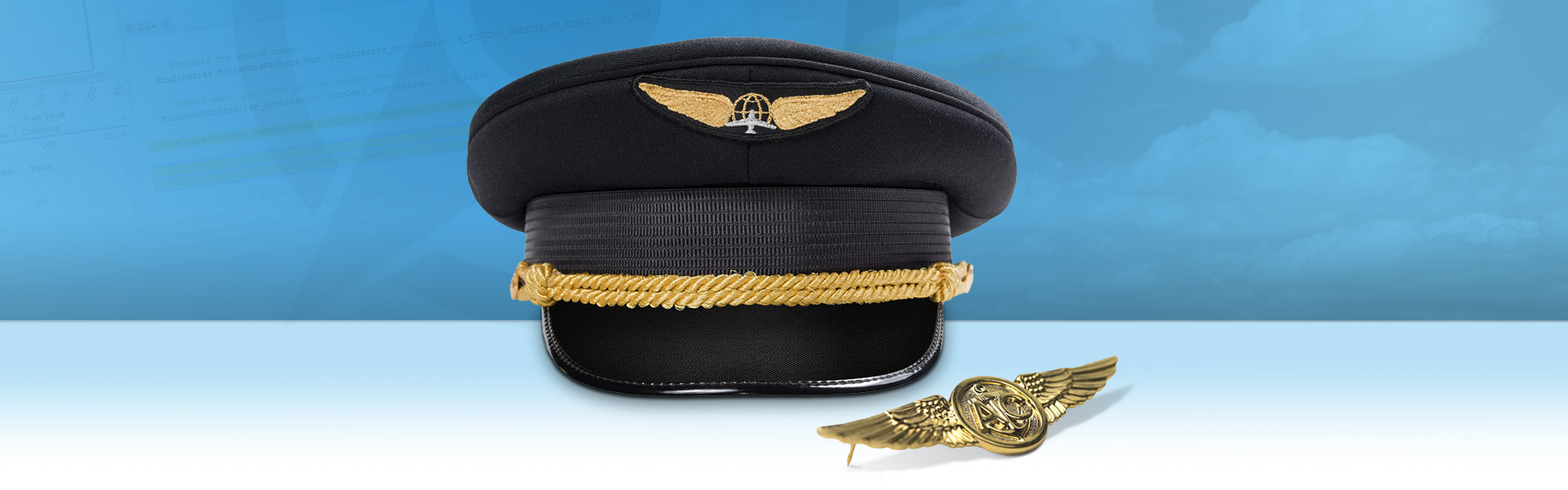 Pilot hat and badge on blue background